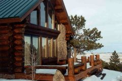Hend chink style log Laramie Wyoming custom home builder handcrafted details (4) - Deerwood Log Homes - Custom Built Homes and Cabins - Laramie, Wyoming and The Centennial Valley - deer-wood.com - (307) 742-6554