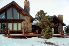 Hend chink style log Laramie Wyoming custom home builder handcrafted details (5) - Deerwood Log Homes - Custom Built Homes and Cabins - Laramie, Wyoming and The Centennial Valley - deer-wood.com - (307) 742-6554
