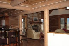 Spec chink style log Big Horn Wyoming custom home builder handcrafted details (1) - Deerwood Log Homes - Custom Built Homes and Cabins - Laramie, Wyoming and The Centennial Valley - deer-wood.com - (307) 742-6554