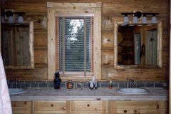 Hend chink style log Laramie Wyoming custom home builder handcrafted details (9) - Deerwood Log Homes - Custom Built Homes and Cabins - Laramie, Wyoming and The Centennial Valley - deer-wood.com - (307) 742-6554