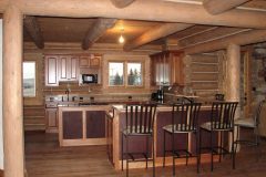 Spec chink style log Big Horn Wyoming custom home builder handcrafted details (2) - Deerwood Log Homes - Custom Built Homes and Cabins - Laramie, Wyoming and The Centennial Valley - deer-wood.com - (307) 742-6554