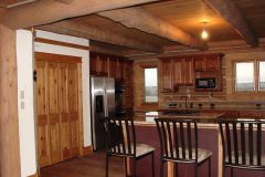 Spec chink style log Big Horn Wyoming custom home builder handcrafted details (3) - Deerwood Log Homes - Custom Built Homes and Cabins - Laramie, Wyoming and The Centennial Valley - deer-wood.com - (307) 742-6554